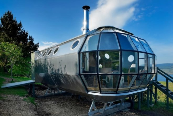an aluminum structure with domed glass wall