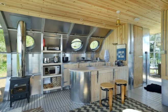 a modern kitchen space with bar area