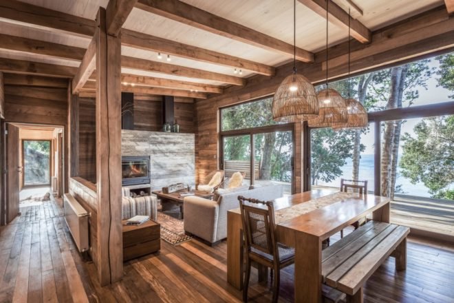 a rustic interior space with many windows