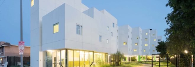 exterior view of white apartment building