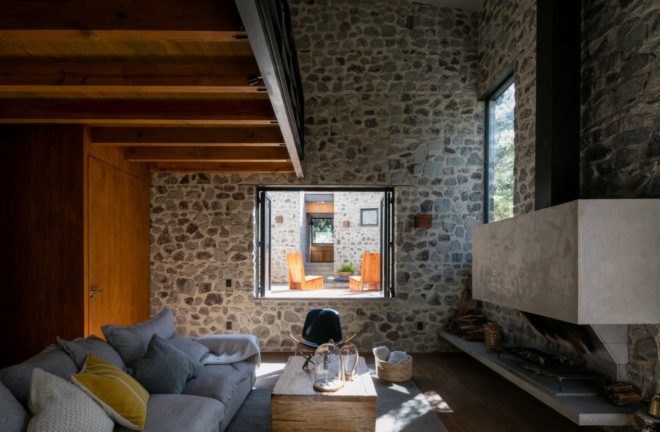 living area with gray couch and wood coffee table