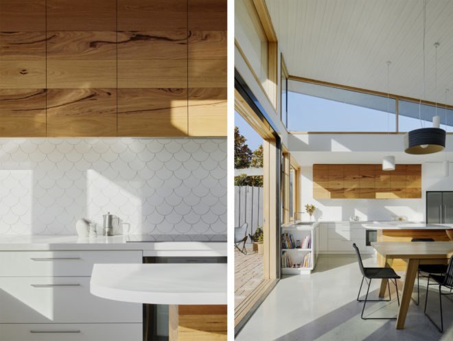 On the left, scalloped backsplash in the kitchen. On the right, open plan dining and kitchen area with wood table and white and light wood cabinetry