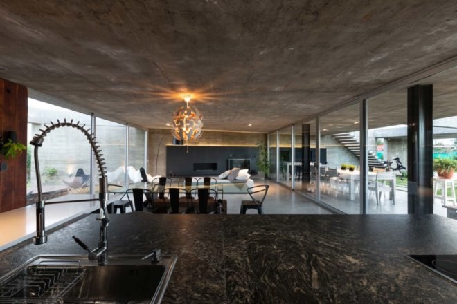large kitchen and dining area with chandelier