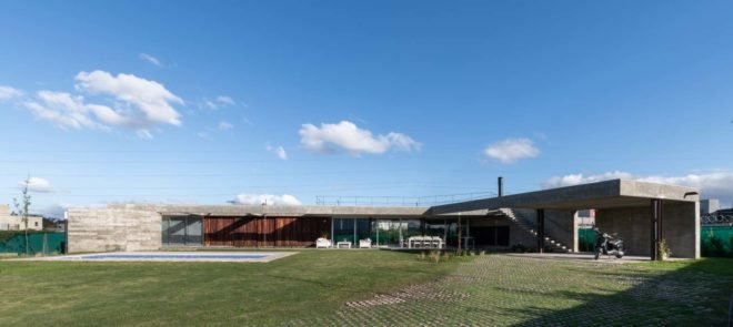 modular home with green lawn