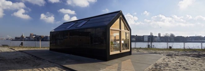 exterior view of black tiny house