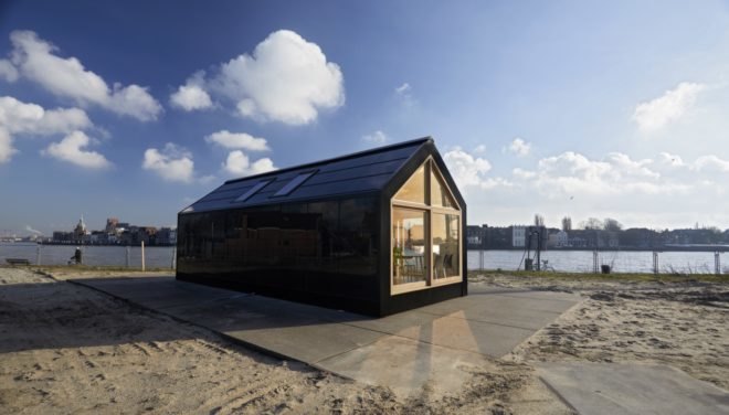 exterior view of black tiny house