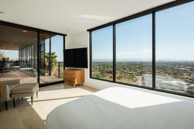 bedroom with panoramic views of desert