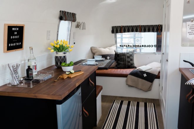 Airstream interior with black, white and brown leather accents.