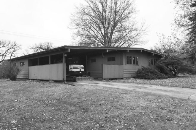 Black and white photo of old home
