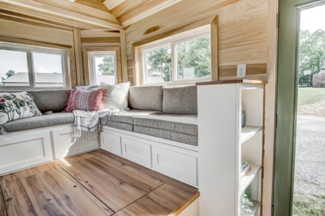 a sofa on an elevated platform