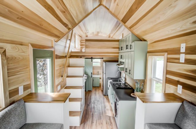 an interior shot of living space with a vaulted ceiling