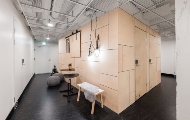 large plywood box volume with closed doors
