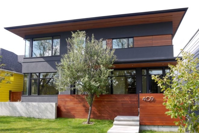 black and warm wood home exterior