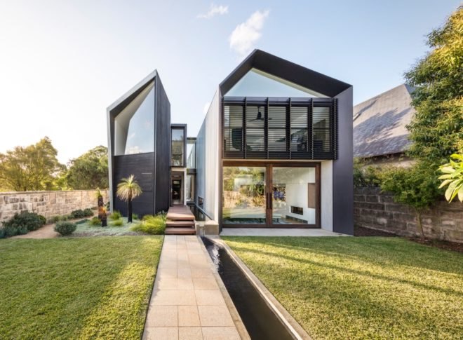 exterior of modern home that is split down the middle