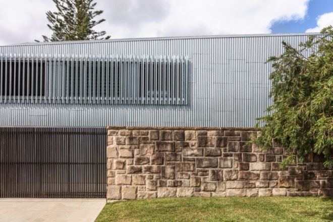 steel and stone facade of modern home