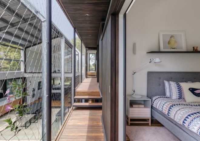 outdoor walkway between two sections of home
