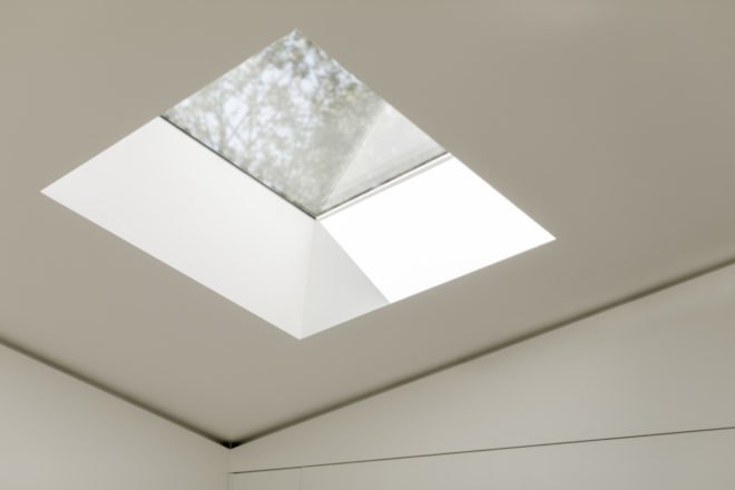 a skylight in a white ceiling
