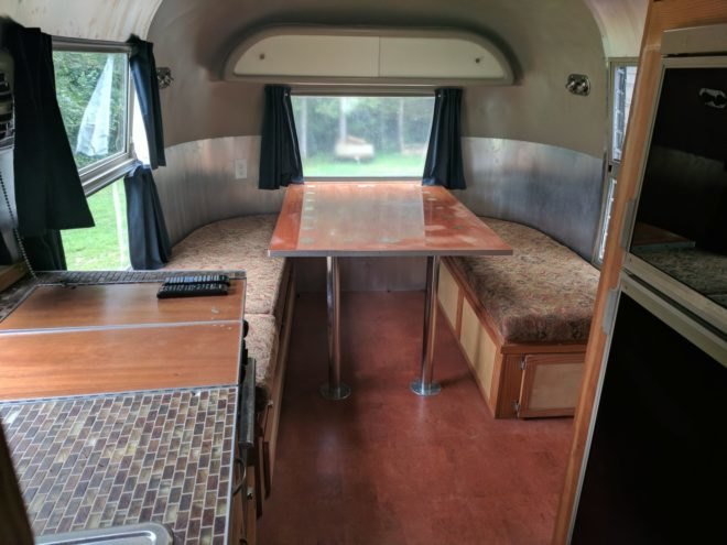 before photos of a dark old airstream interior