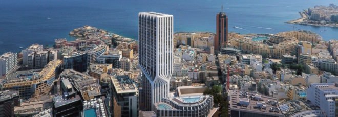 aerial view of tall white tower with twisting middle
