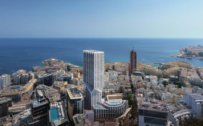 aerial view of tall white tower with twisting middle