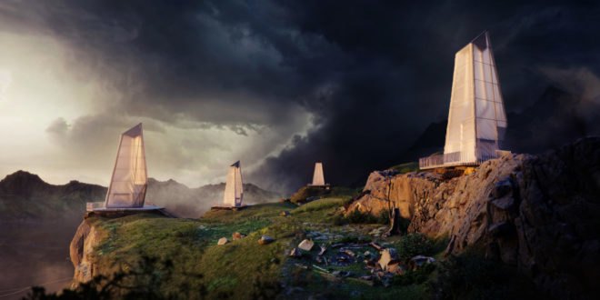 a series of fabric-covered structures on rugged landscape during a storm