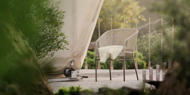 a chair placed next to a tent-like structure