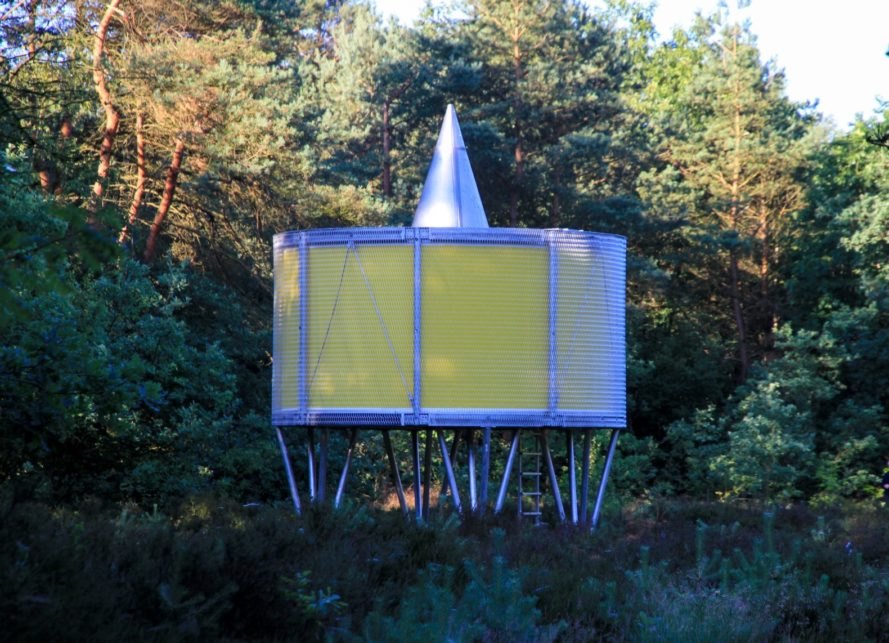 round yellow pavilion on metal supports
