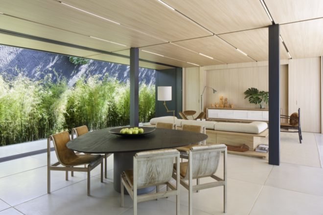 living area with walls of glass