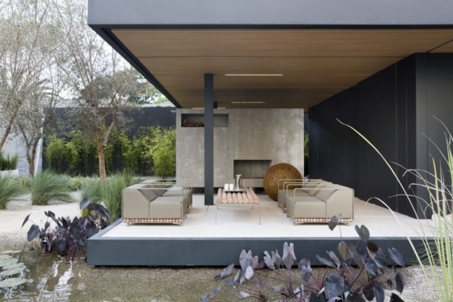 outdoor living area with several chairs