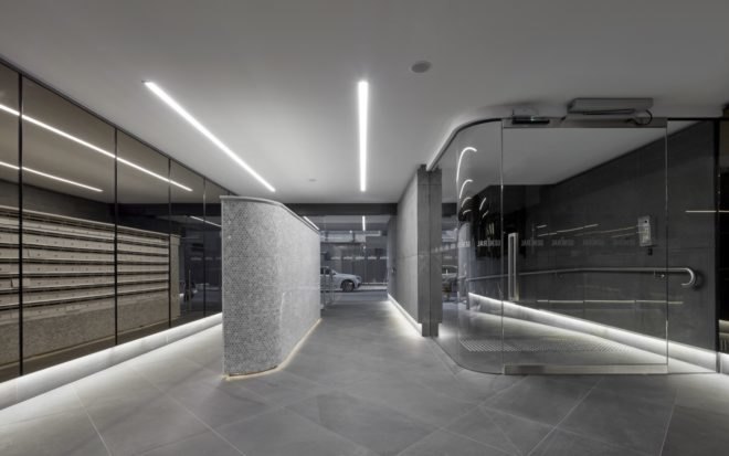 interior hallway with metallic paneling