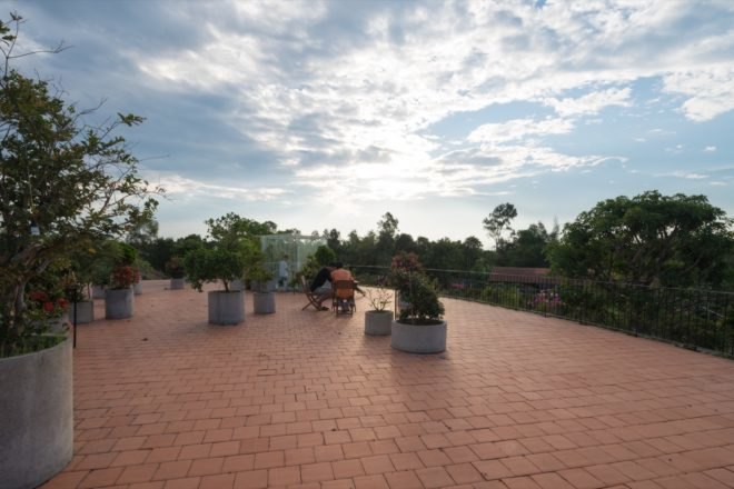 accessible roof with view of green landscape