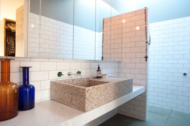 bathroom with pink granite sink