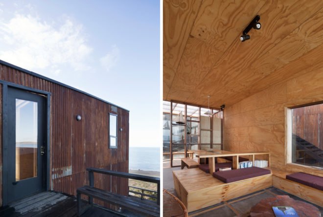 On the left, walkway to the entrance. On the right, living space with wood benches and light wood walls.