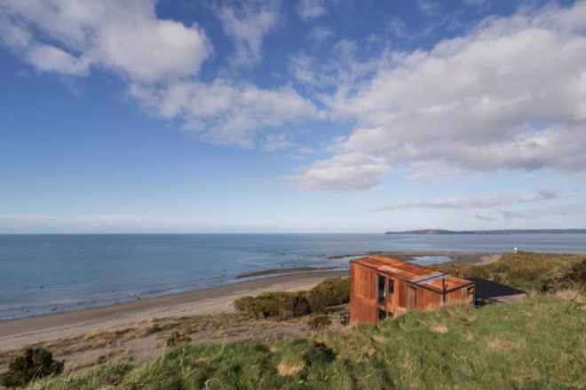 view of the lodge from the grass field