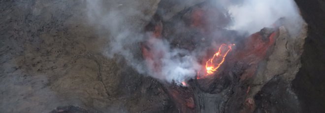 Aerial view of small lava pond in fissure 8 of Kilauea volcano