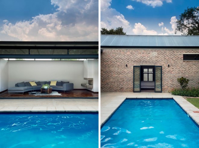 On the left, gray curved couch inside building with glass wall opened up to pool area. On the right, rectangular pool facing open glass doors to a bedroom.