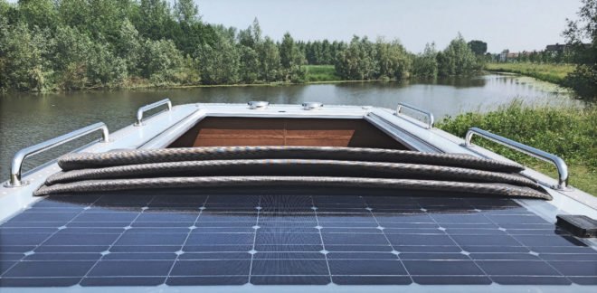 Top of camper with solar panel and open roof
