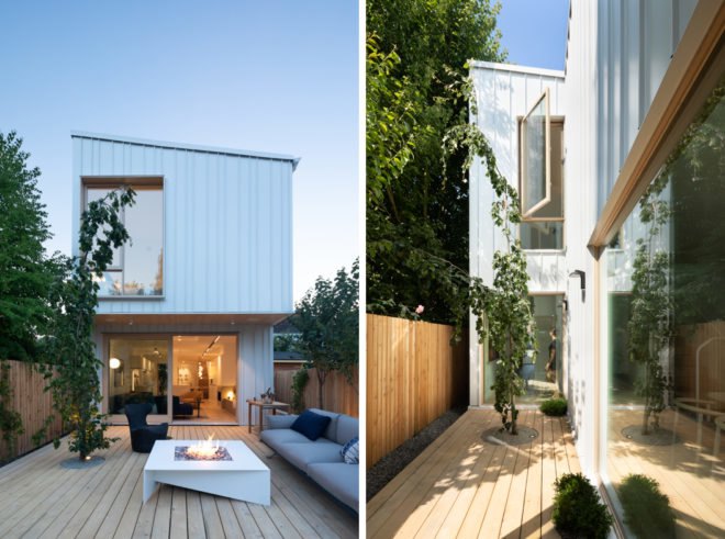 On the left, narrow white house at dusk. On the right, narrow patio space on the side of the house