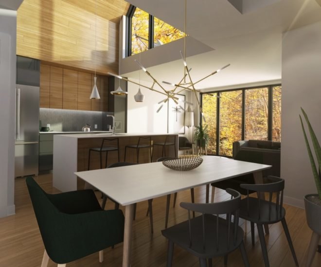 white dining table in front of kitchen with white island and wood cabinets