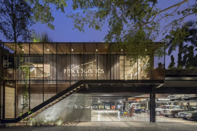 side view of shipping containers stacked to make a gallery building