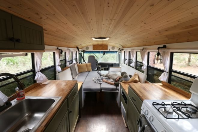 small kitchen with wood counters and a stove and sink