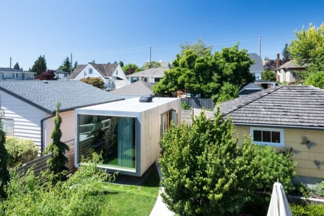 white shipping container with large windows