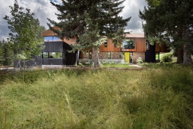 Weathered steel and charred timber modern farmhouse