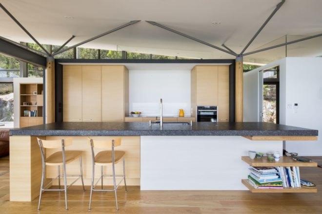 kitchen with light wood cabinetry and large island