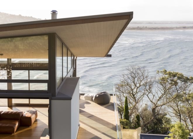balcony with beanbag chairs facing the ocean