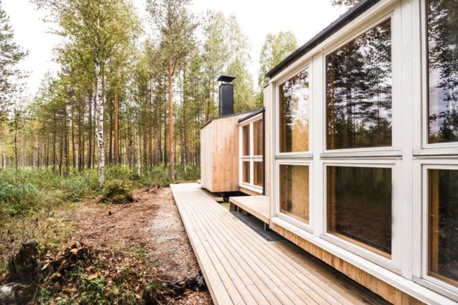 side view of cabin with large windows