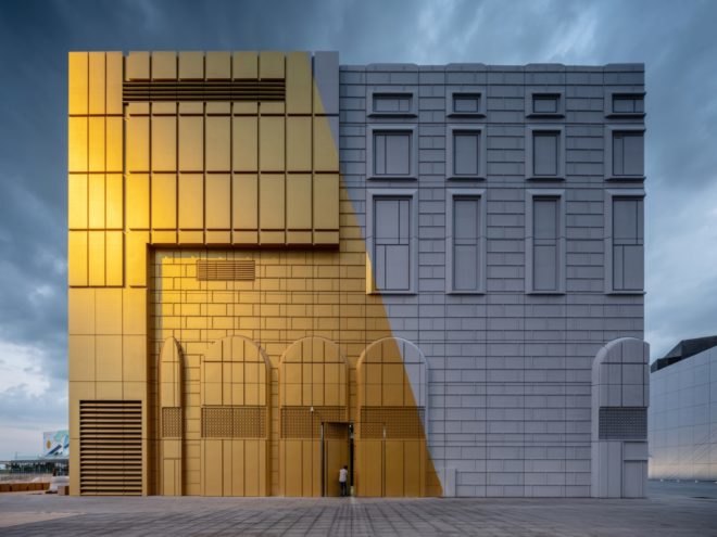 building painted partially white and partially gold