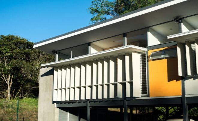 white solar shades over windows