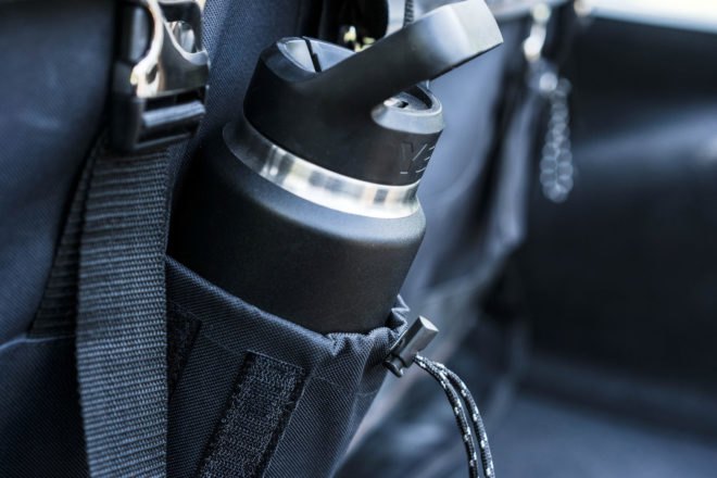 durable water bottle in a backpack pocket