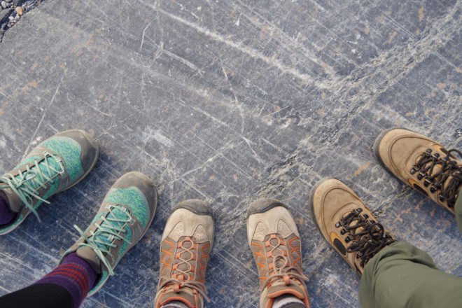 aerial view of three pairs of hiking boots